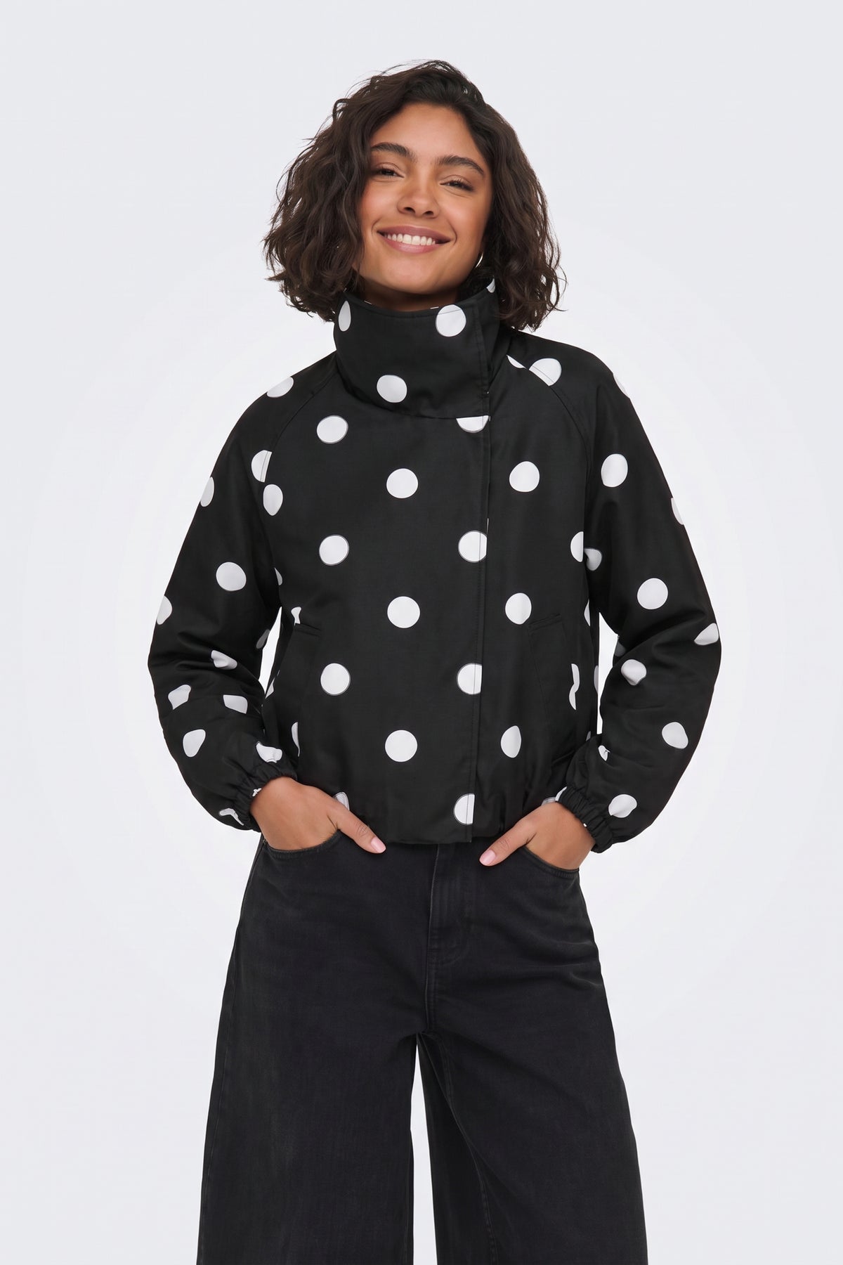 Black Jacket Polka Dot Funnel Neck on model, front view
