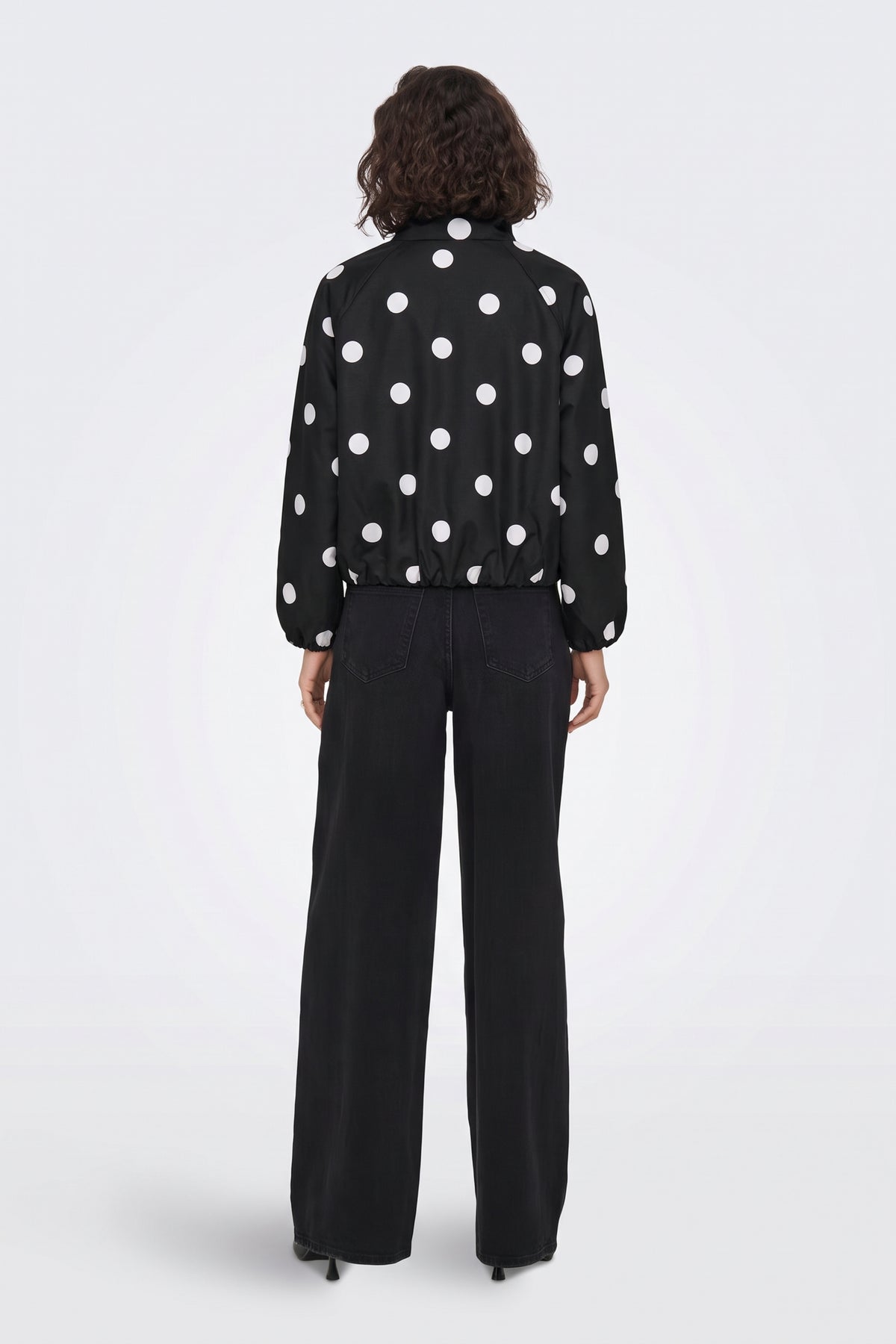Black Jacket Polka Dot Funnel Neck side view on model