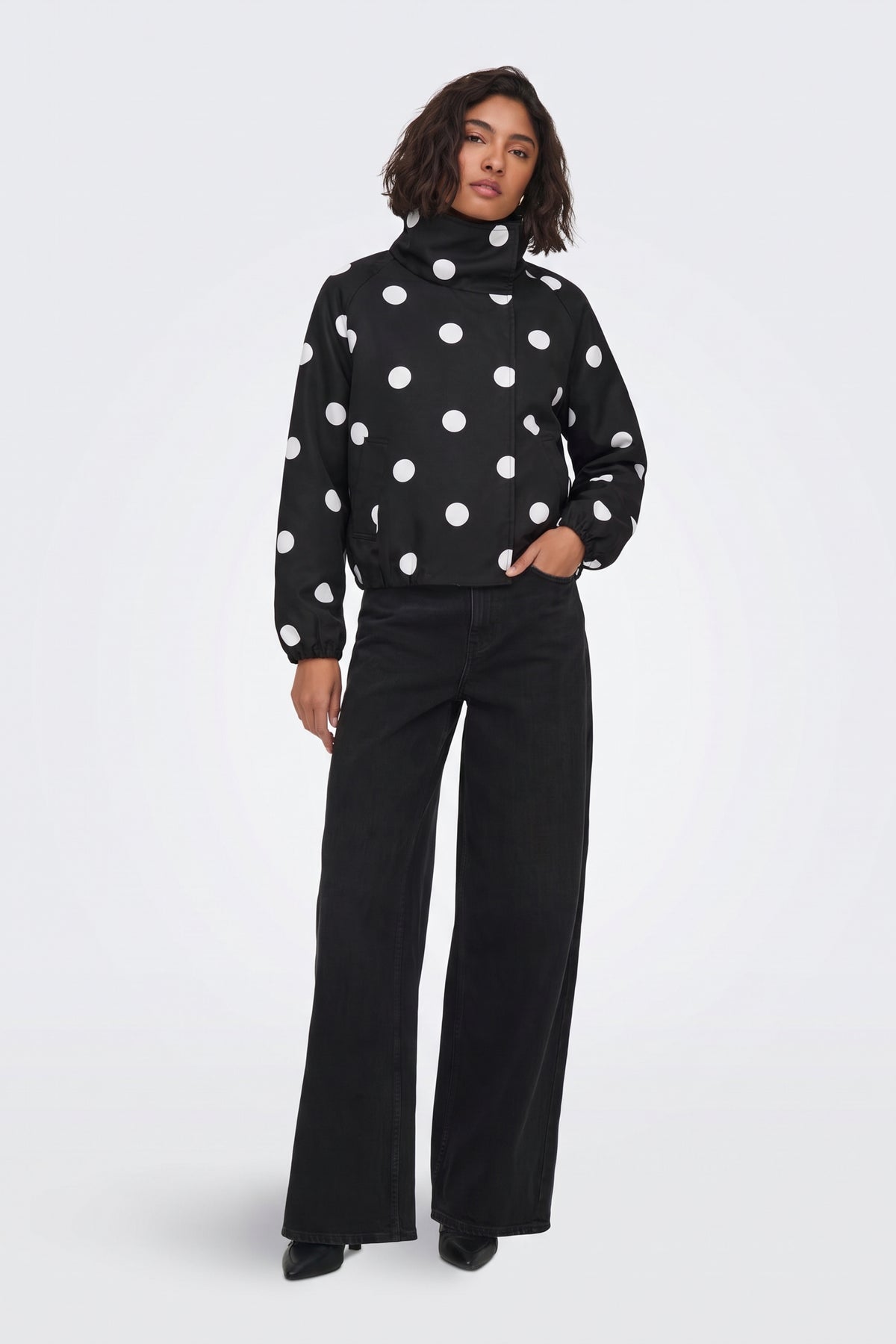 Black Jacket Polka Dot Funnel Neck back view on model