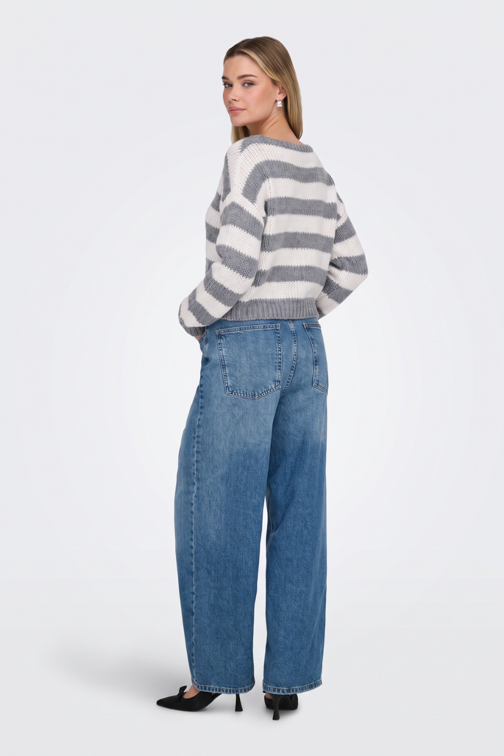 Grey striped cropped jumper back view on model