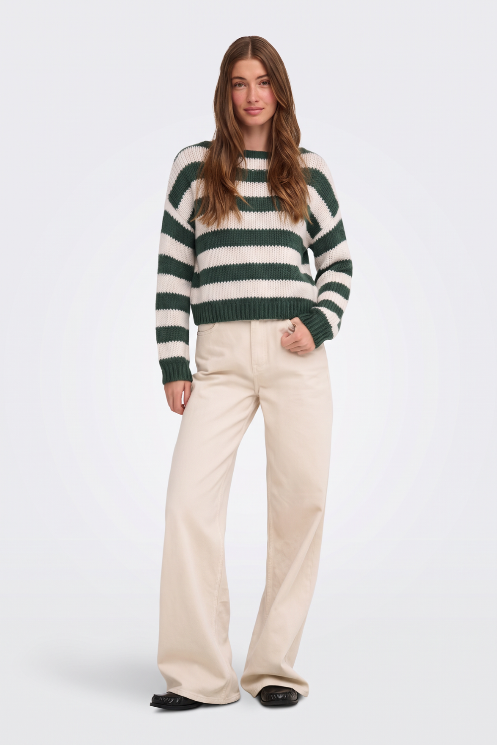 Green striped cropped jumper with cream wide-leg trousers, full length