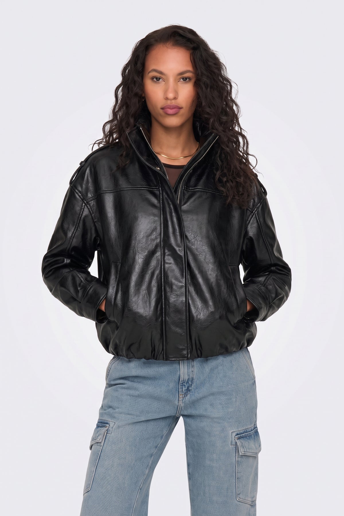 Faux Leather Jacket Black Oversized Funnel Neck on model, front view