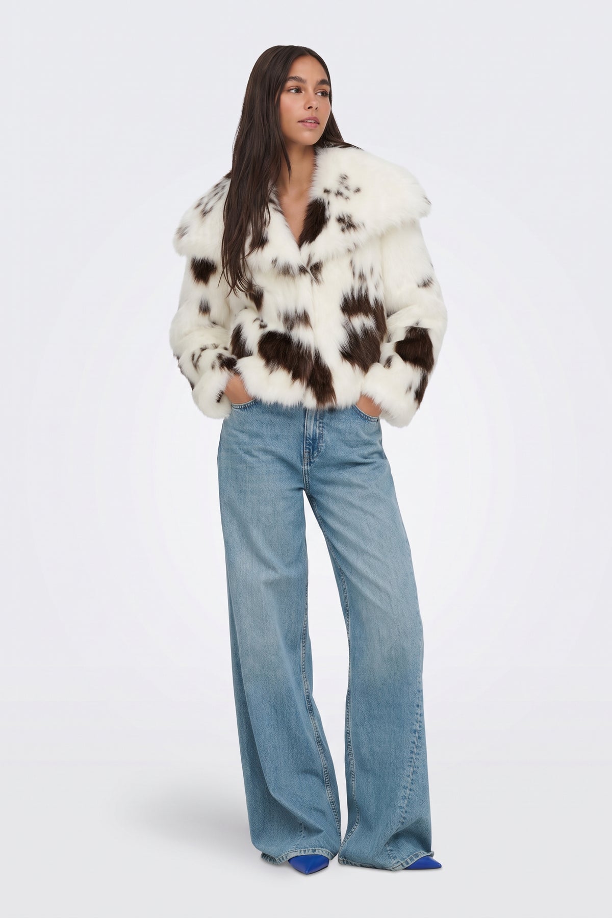 Faux Fur Jacket Cream Cow Print Cropped full length on model