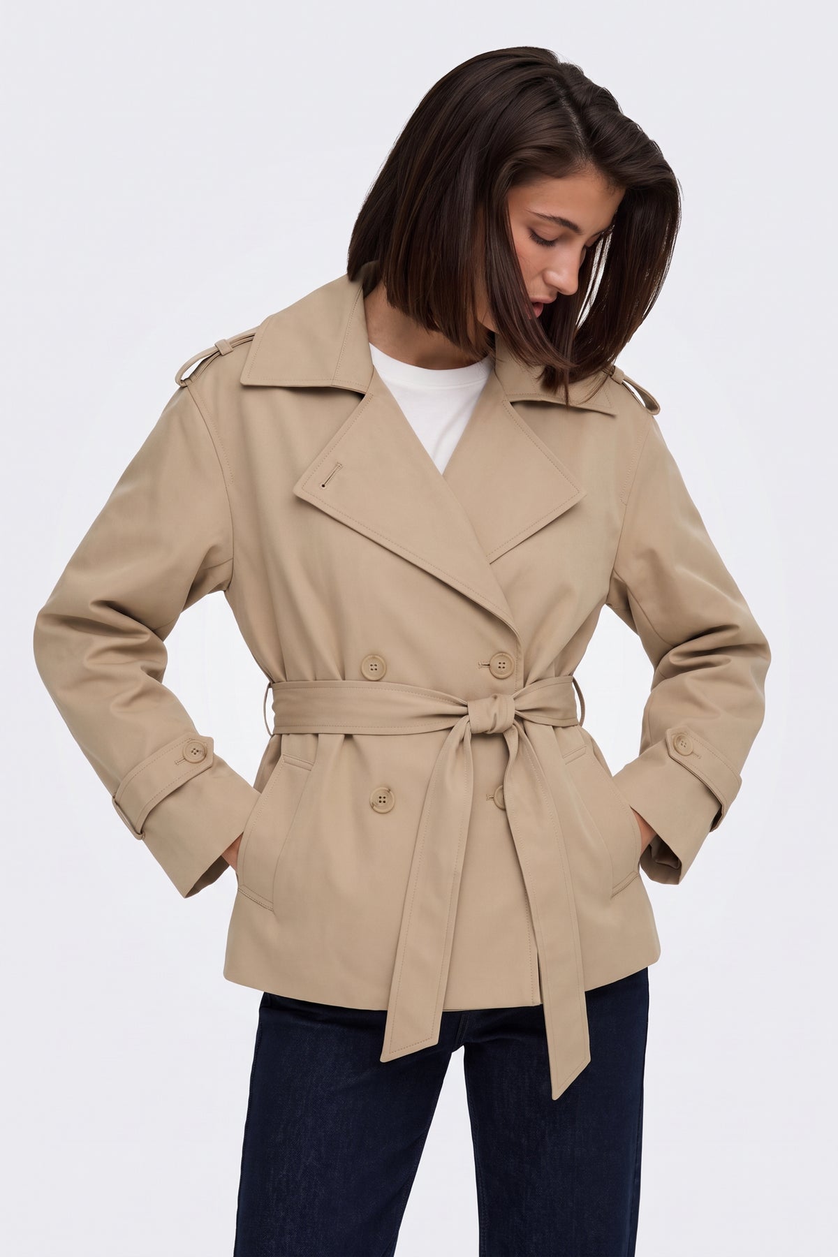 Camel wrap trench jacket tied at the waist