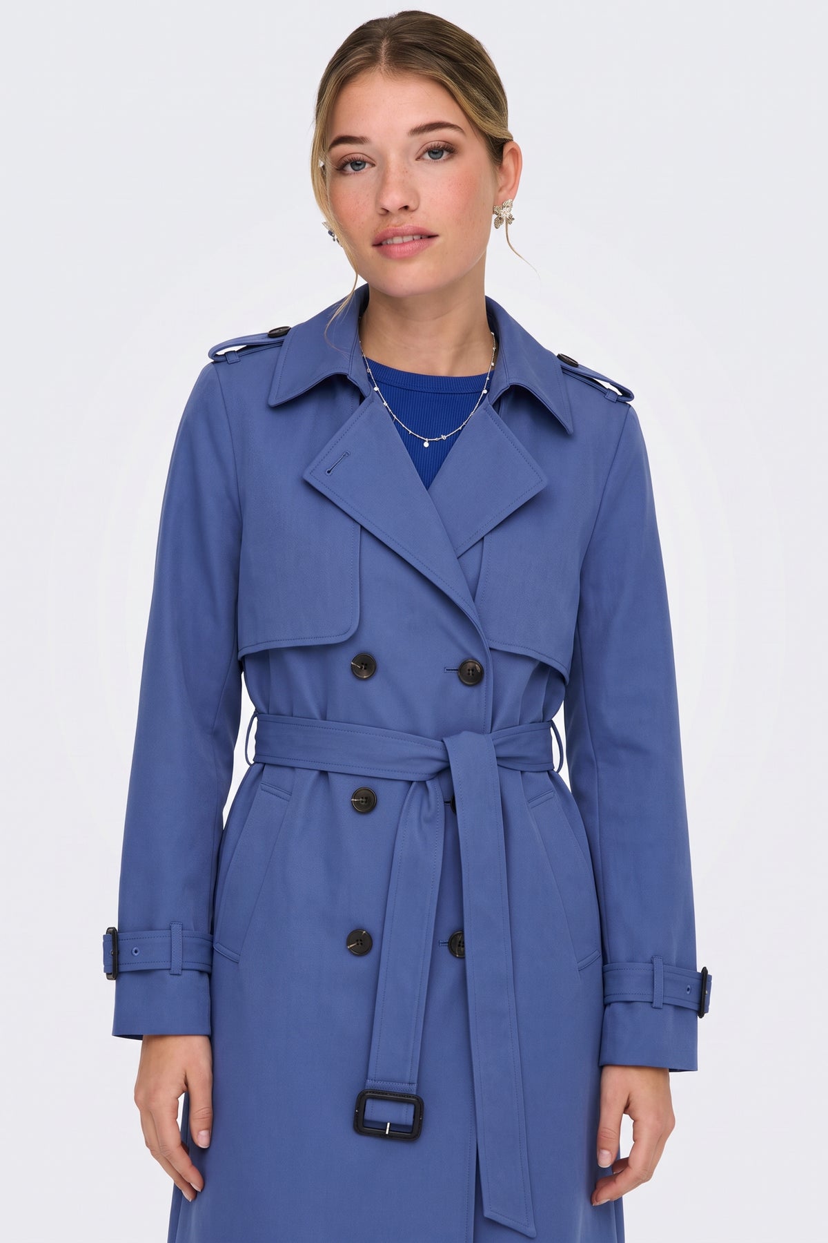 Blue trench coat belt buckle and double breasted buttons