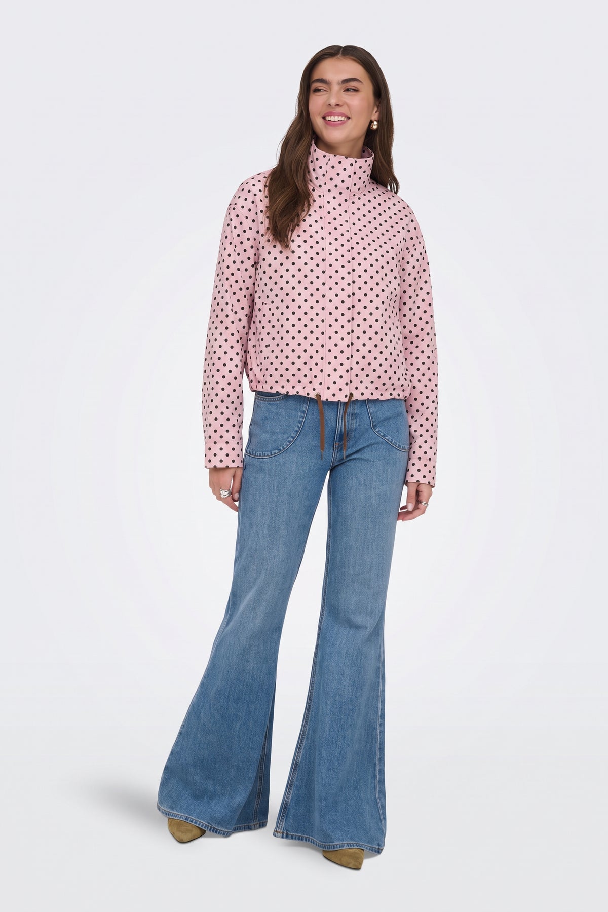 Pink polka dot cropped jacket, full length on model