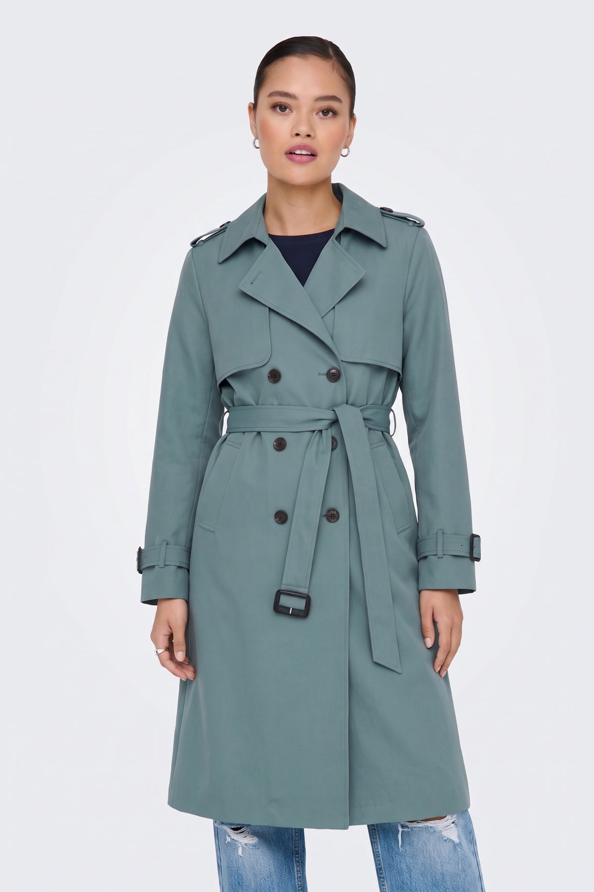 Sage belted trench coat on model, front view