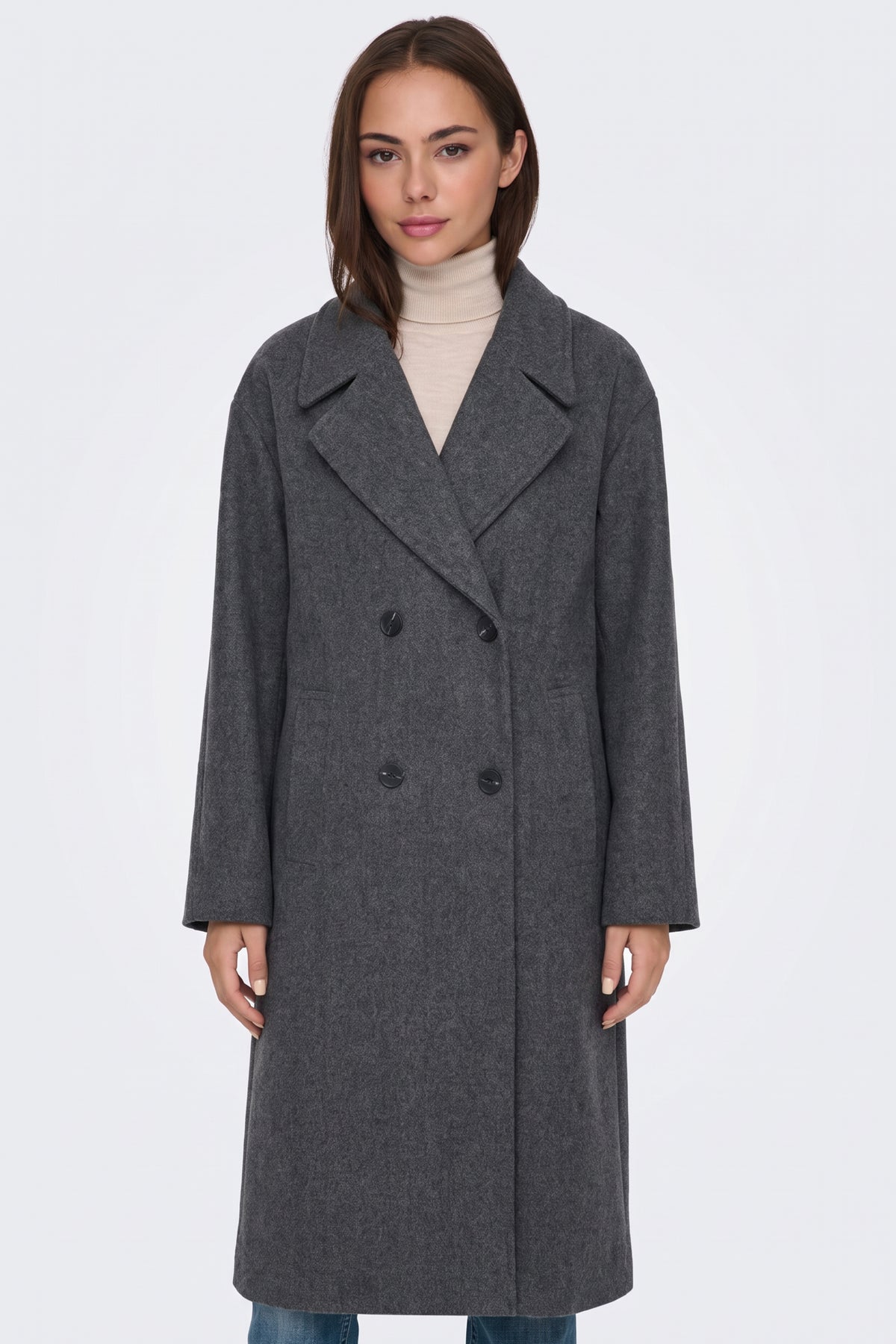 Dark grey coat with wide notched lapels, close-up on model