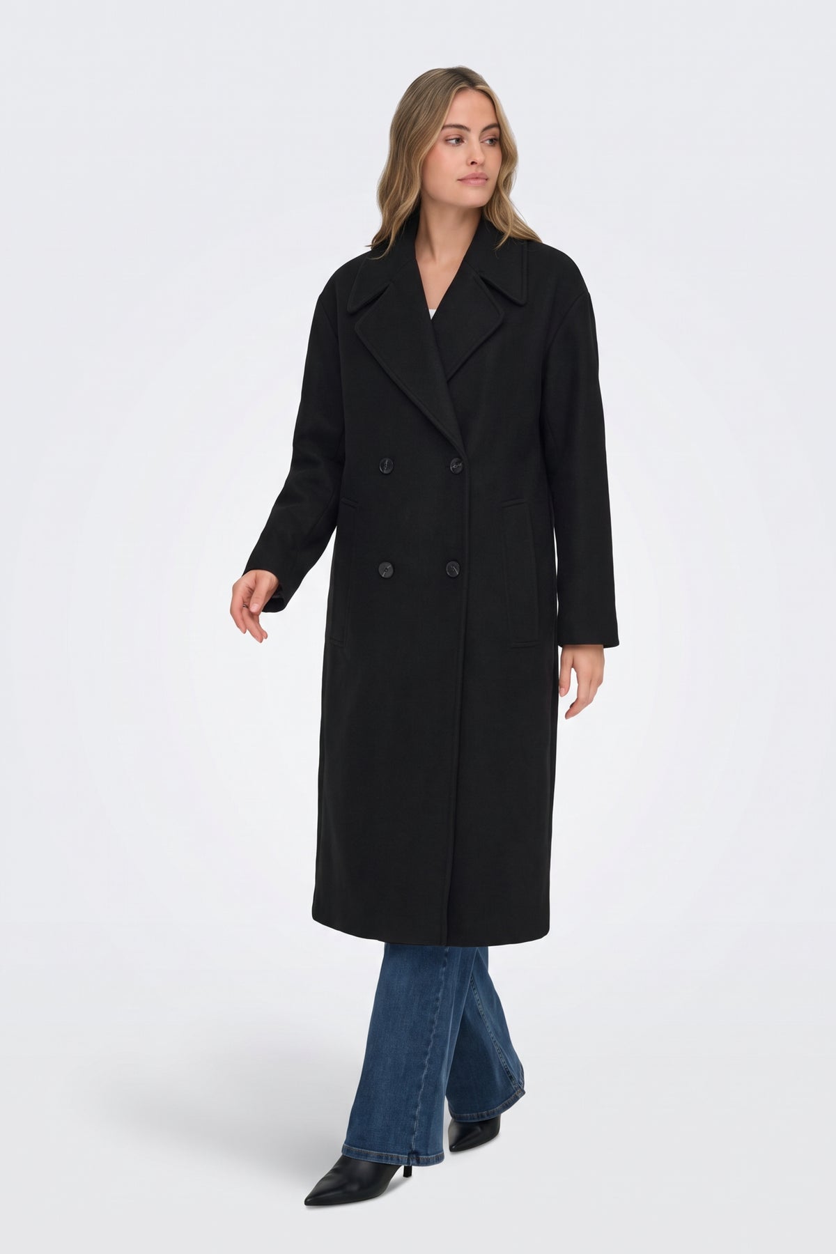 Long black oversized coat, full length on model