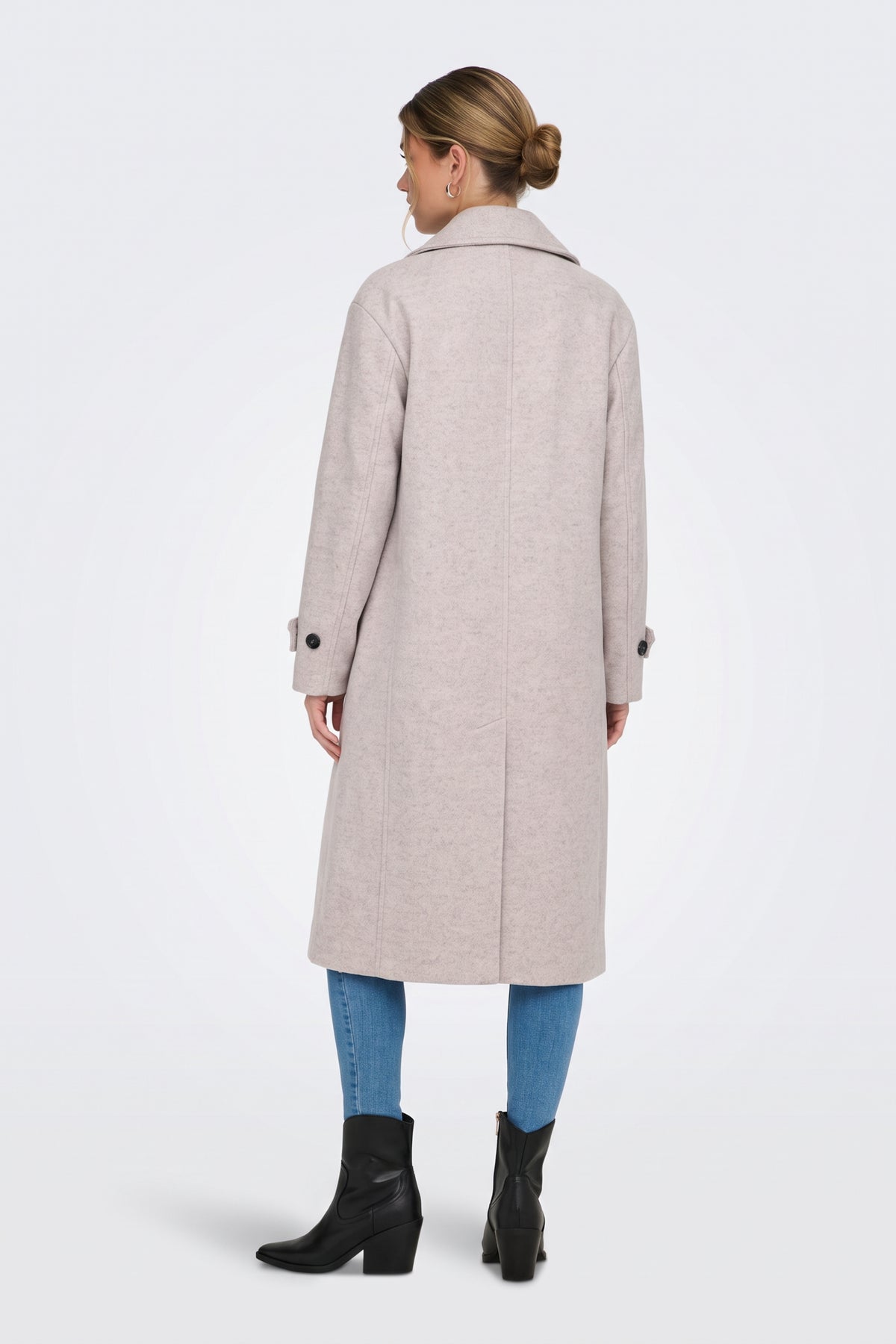 Light grey long coat back view with cuff tabs and back vent, on model