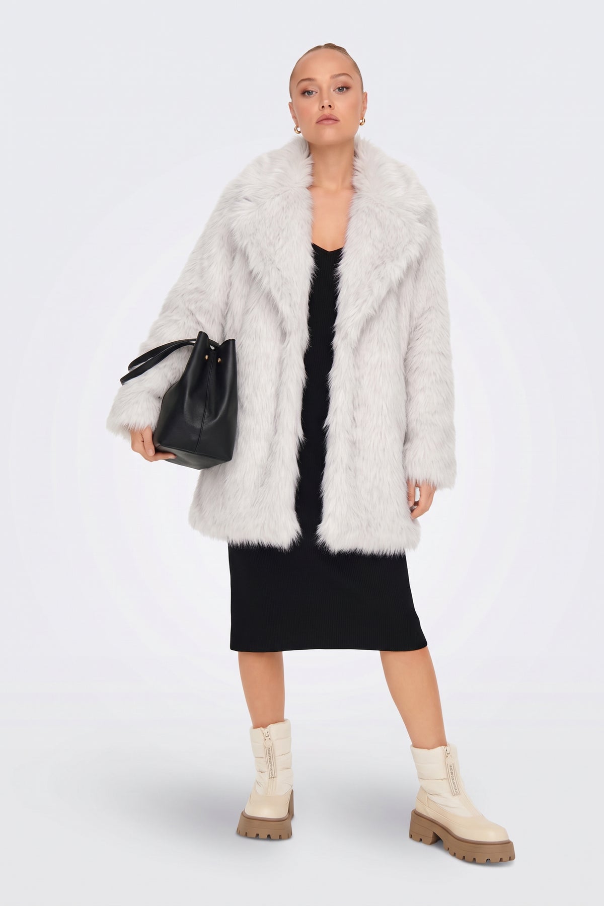 White longline faux fur coat full length on model