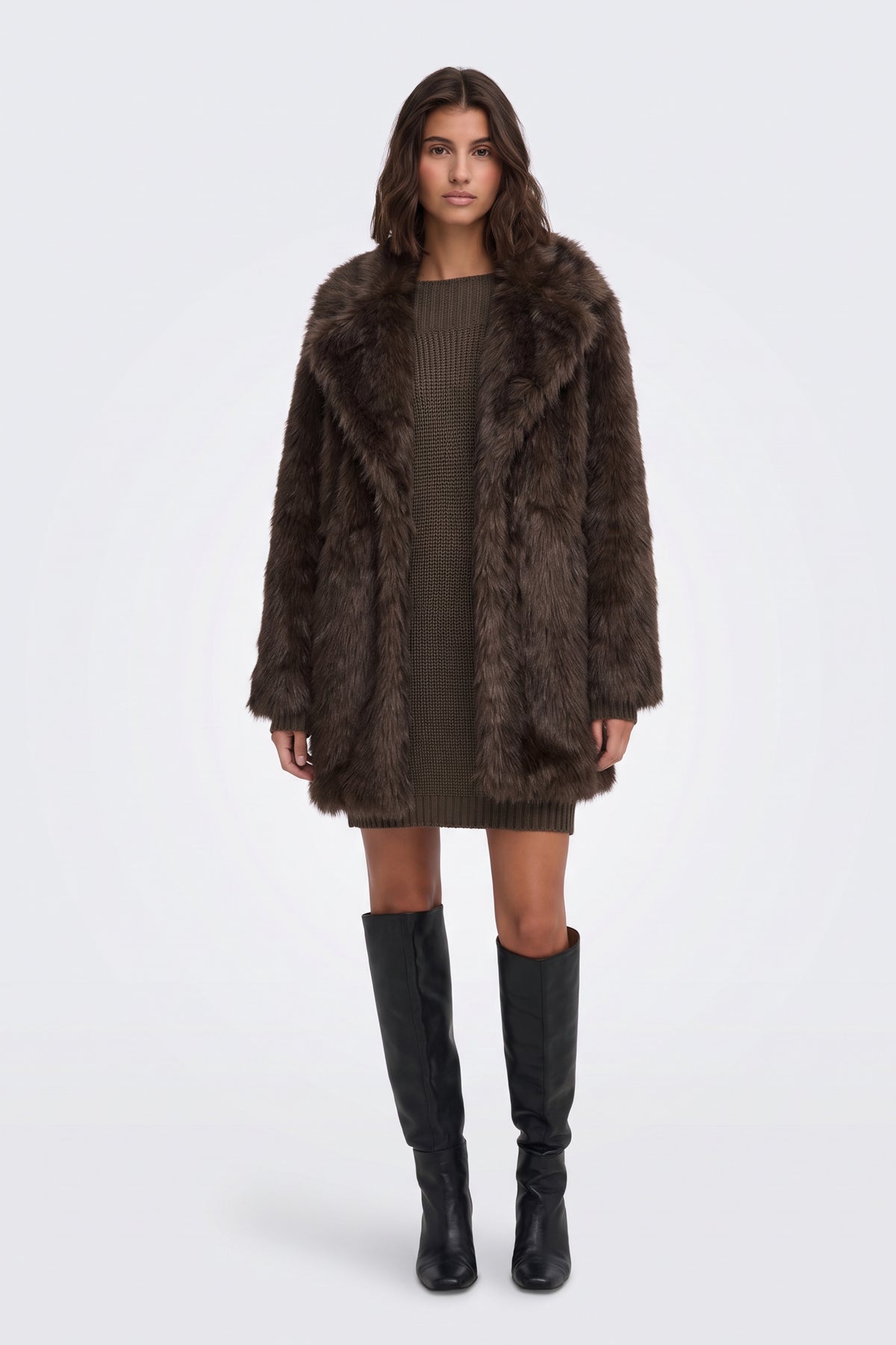 Brown longline faux fur coat full length on model