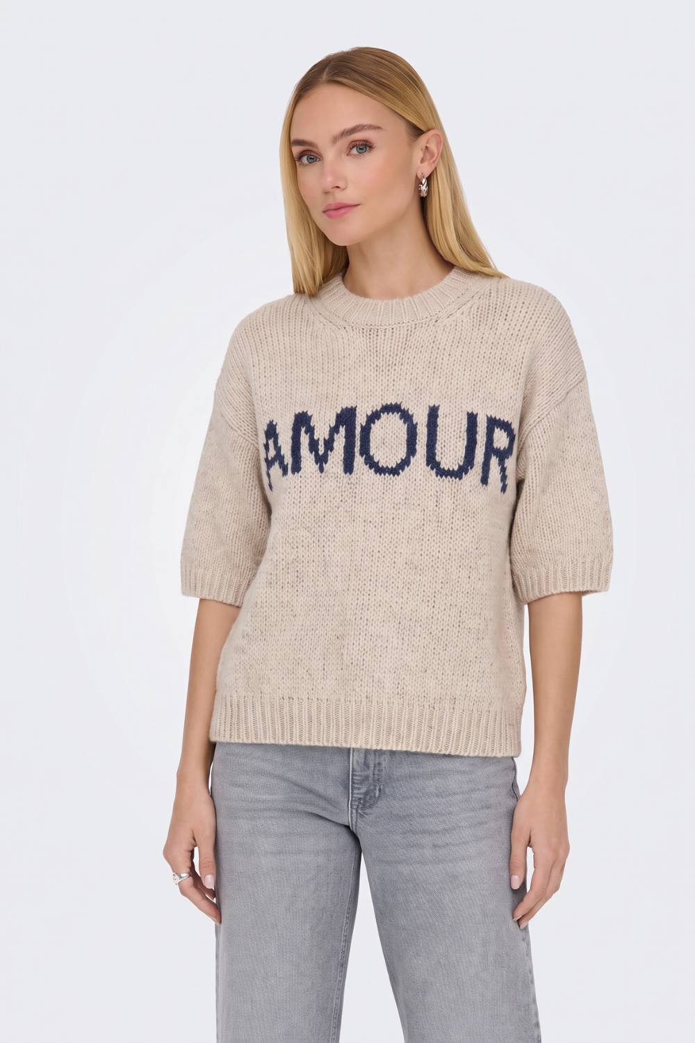 Beige short sleeve knitted jumper with navy Amour slogan, on model