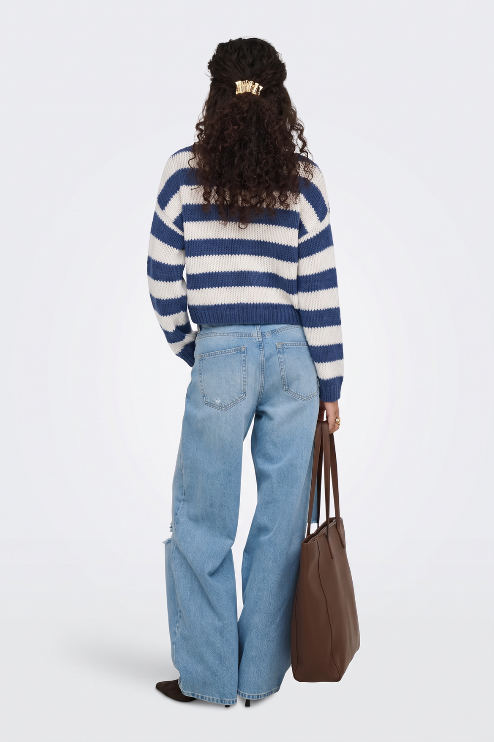 Blue striped cropped jumper back view on model