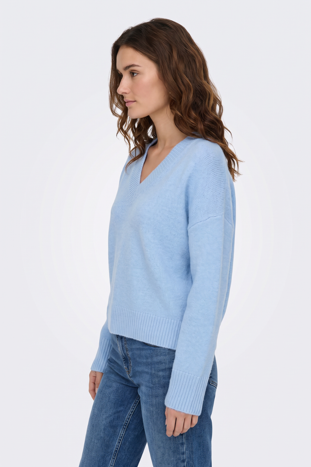 Light blue cropped jumper side view on model