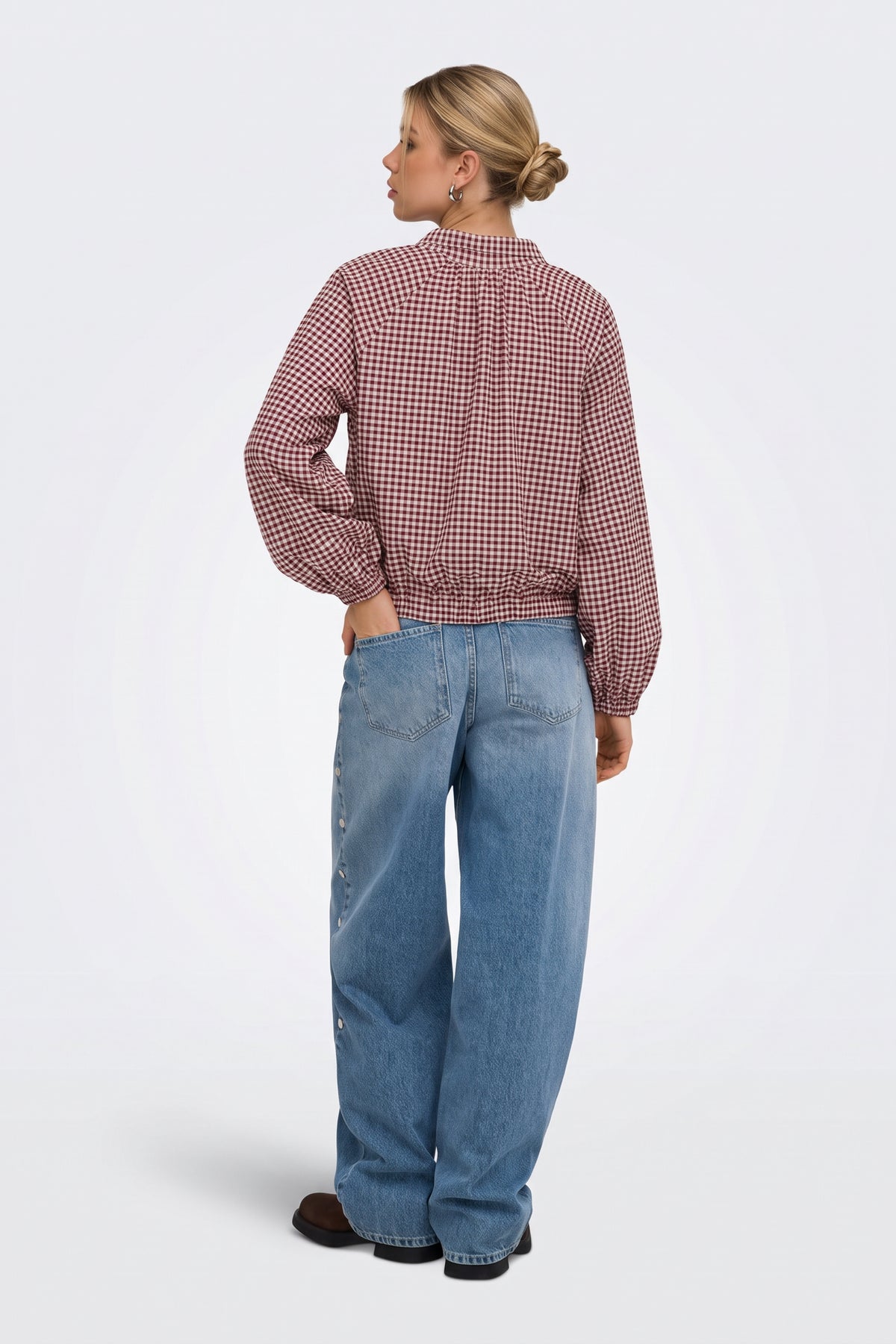 Burgundy gingham check jacket back view on model