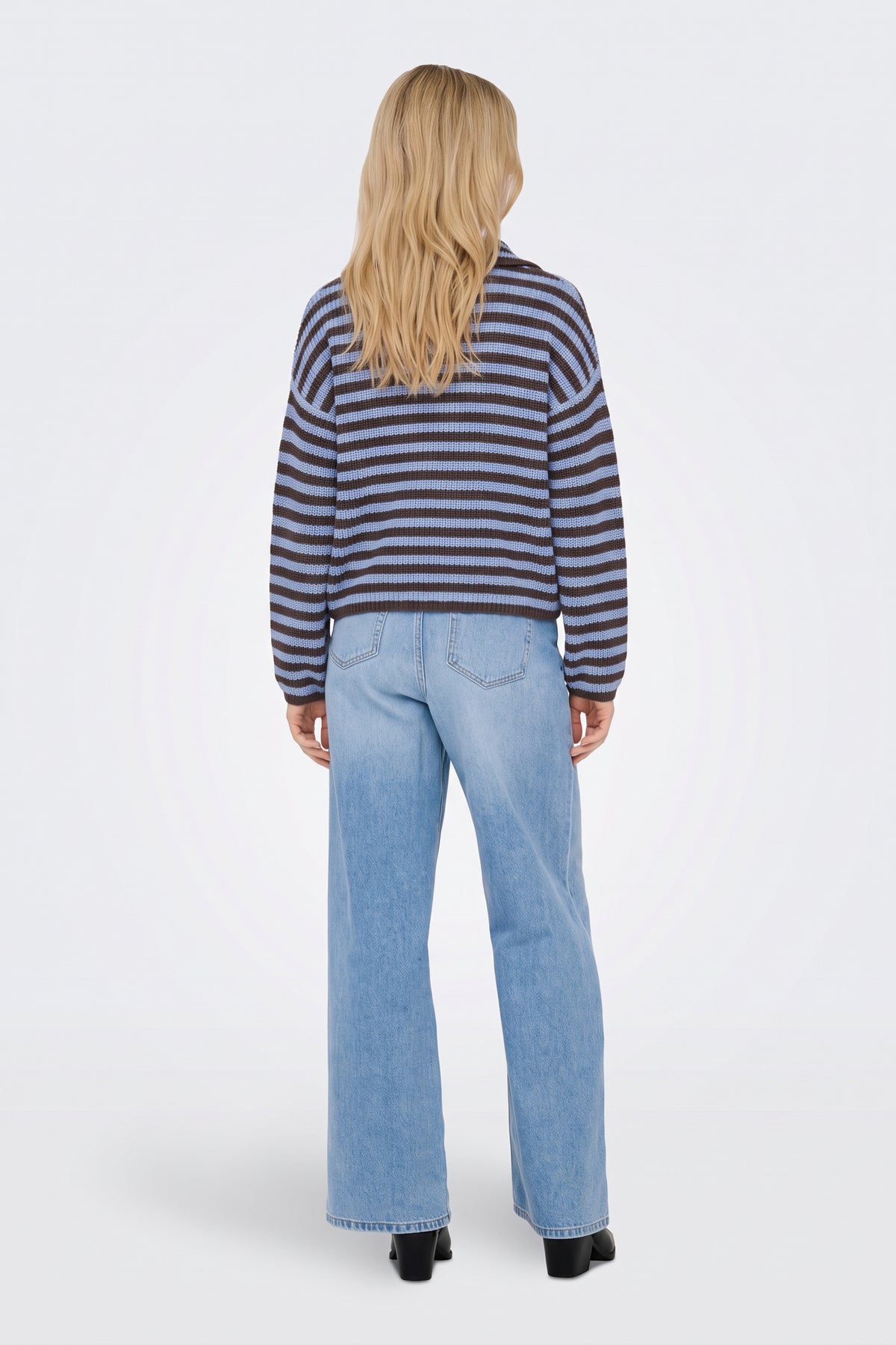 Navy piece worn on model, back view
