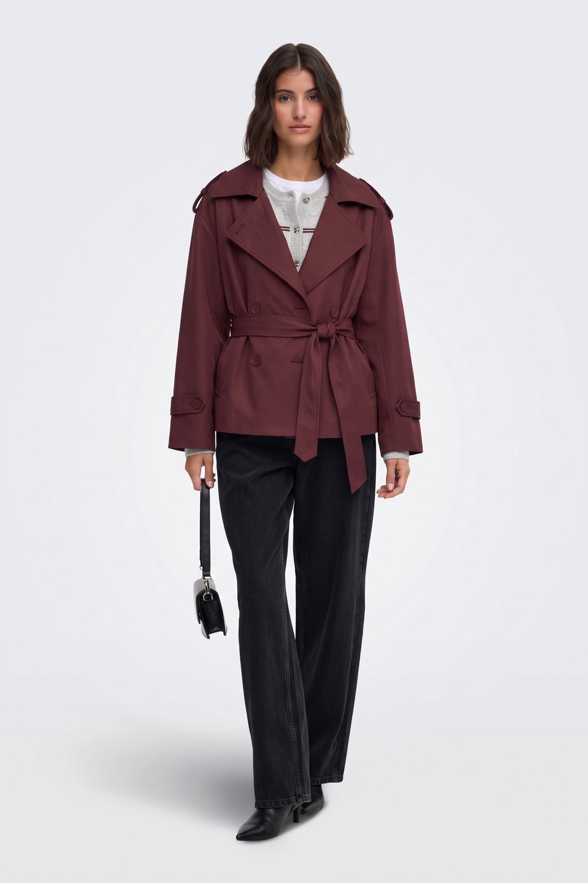 Burgundy short trench jacket full length on model