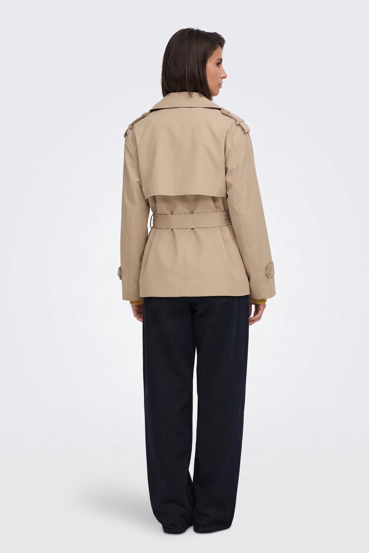 Camel short trench jacket back view with storm flap
