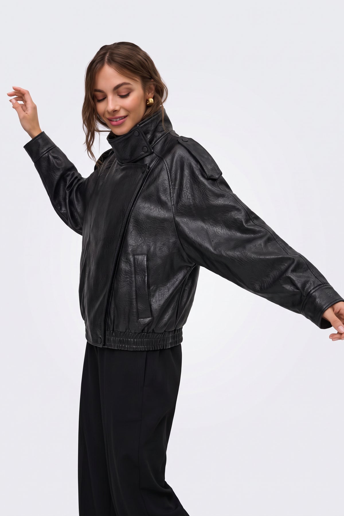 Black oversized faux leather jacket with elasticated hem, on model