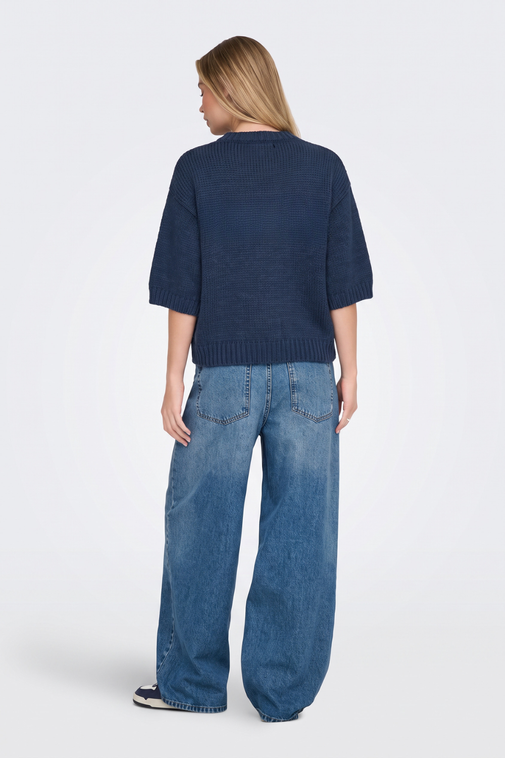 Navy short sleeve cropped jumper back view on model