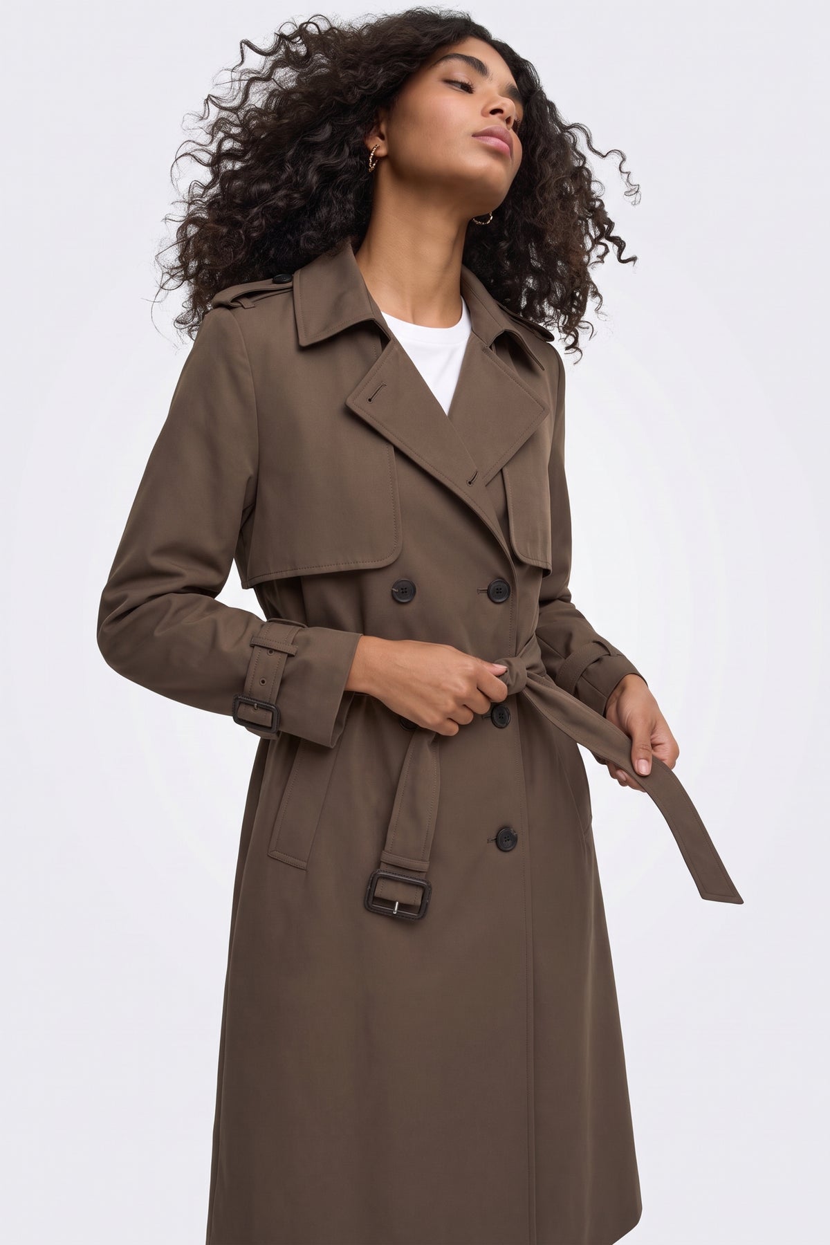 Brown trench coat belt buckle and double breasted buttons