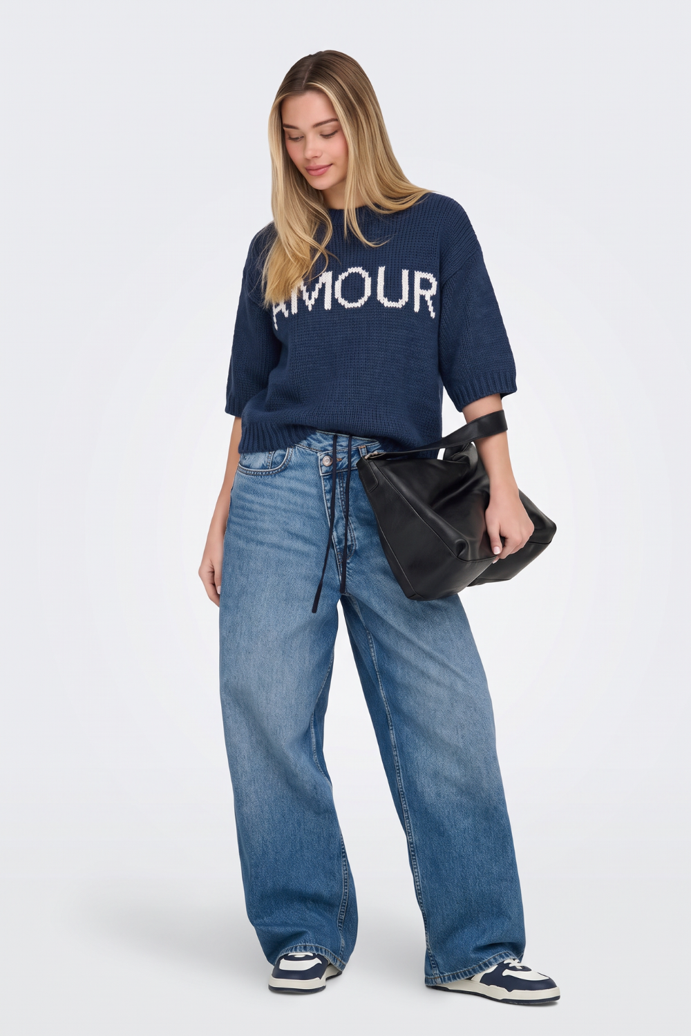 Navy short sleeve cropped jumper with wide-leg jeans, full length