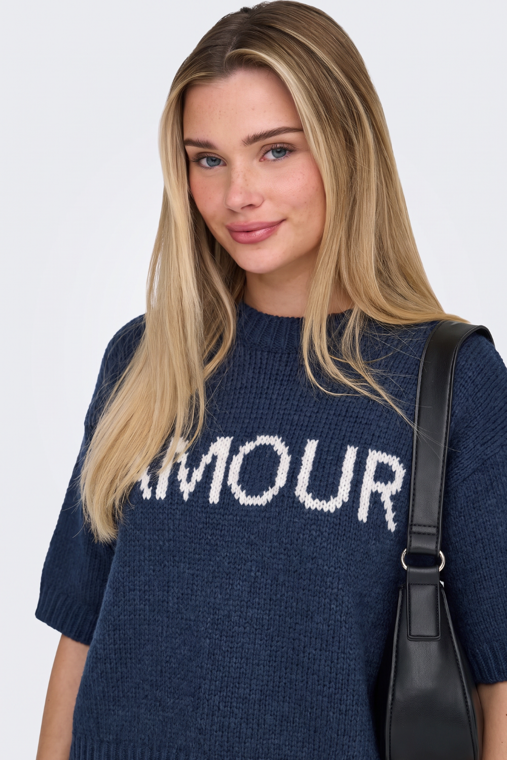 Navy Amour slogan knit jumper, close-up on model