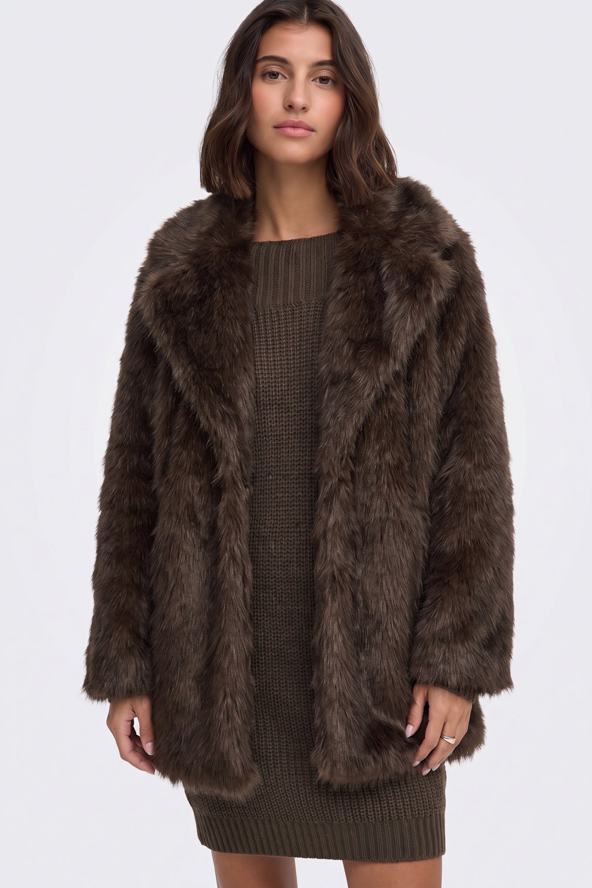 Brown longline faux fur coat on model, front view
