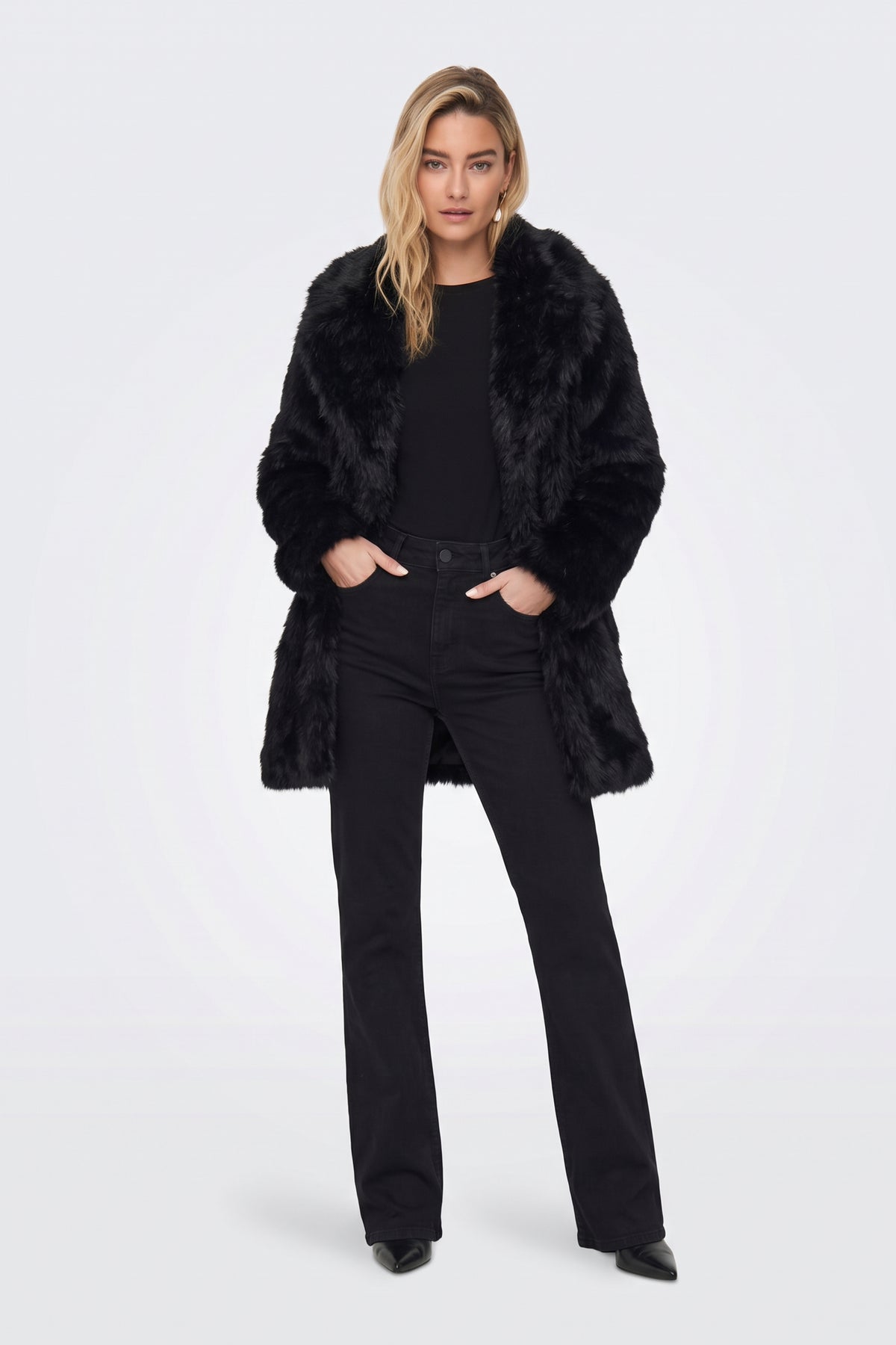 Black longline faux fur coat full length on model