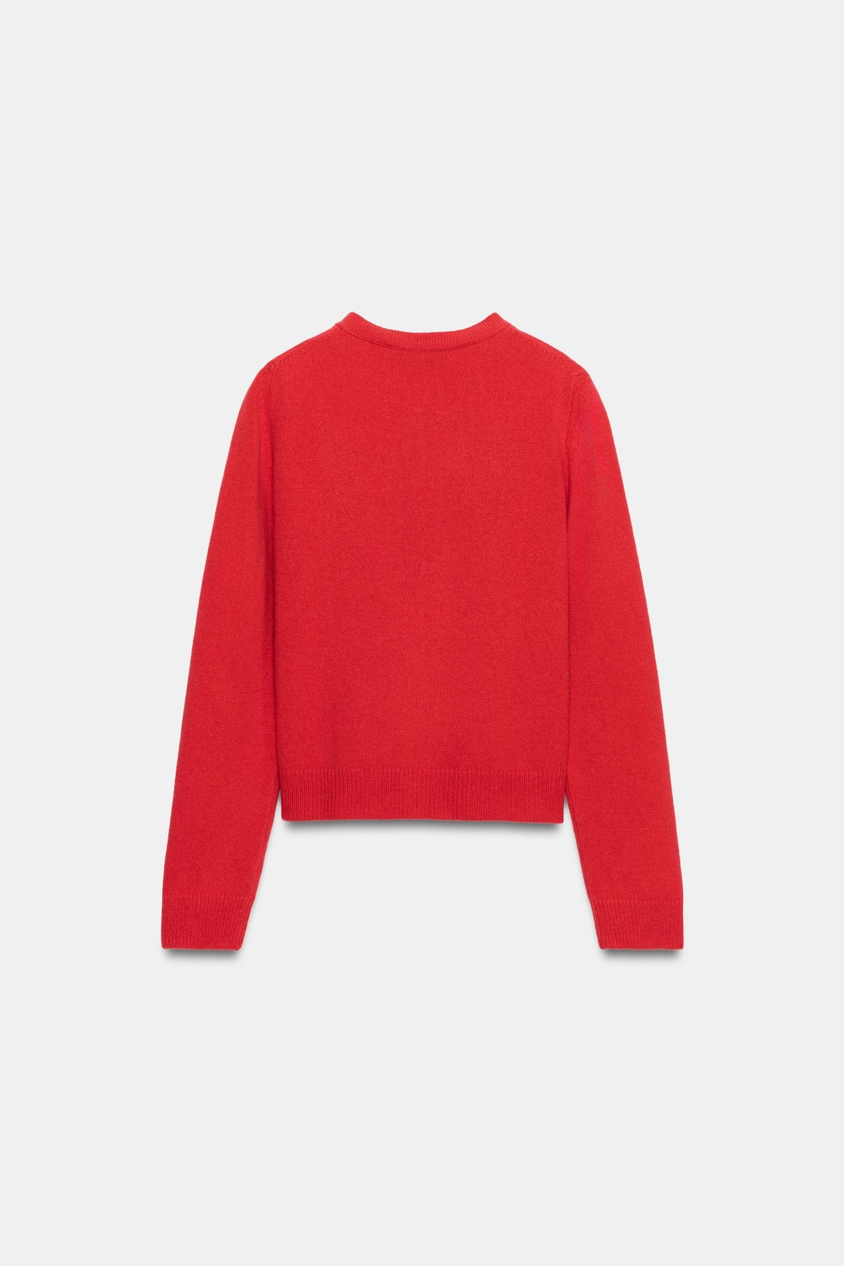 Red piece worn on model, back view
