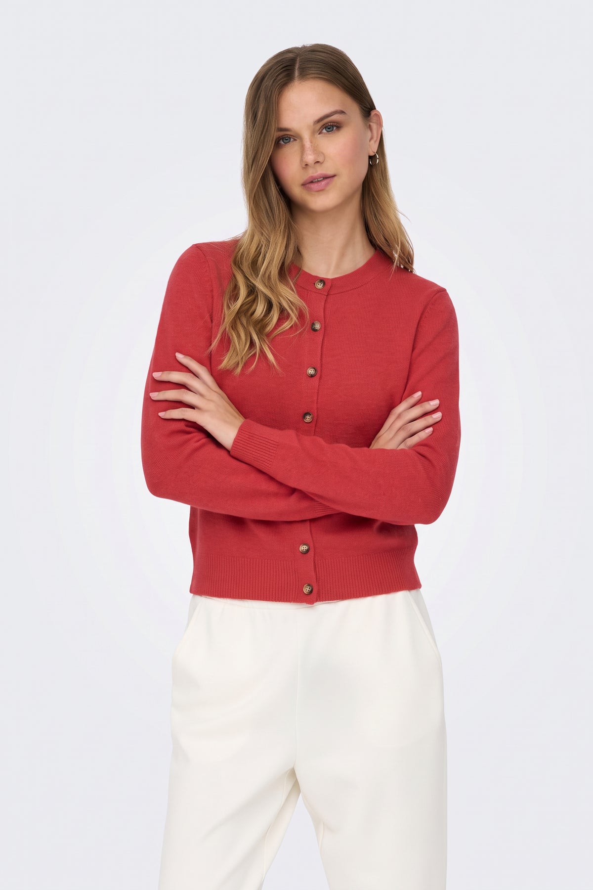 Red piece worn on model, front view