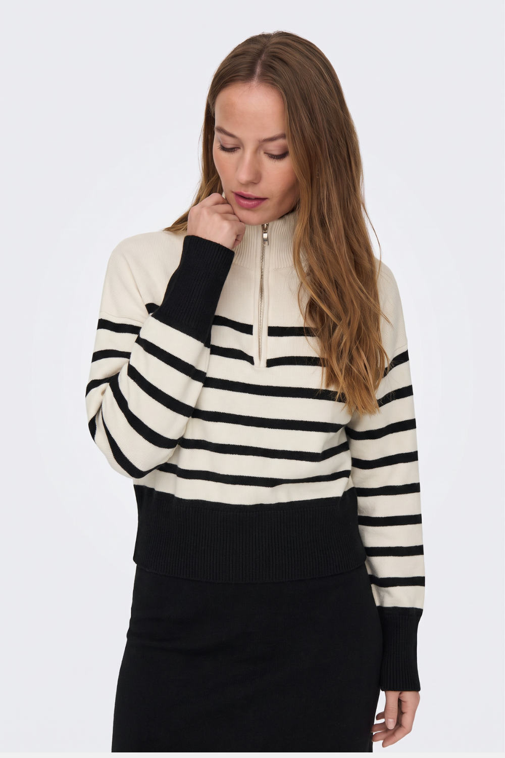Cream striped half zip jumper with ribbed hem band, on model