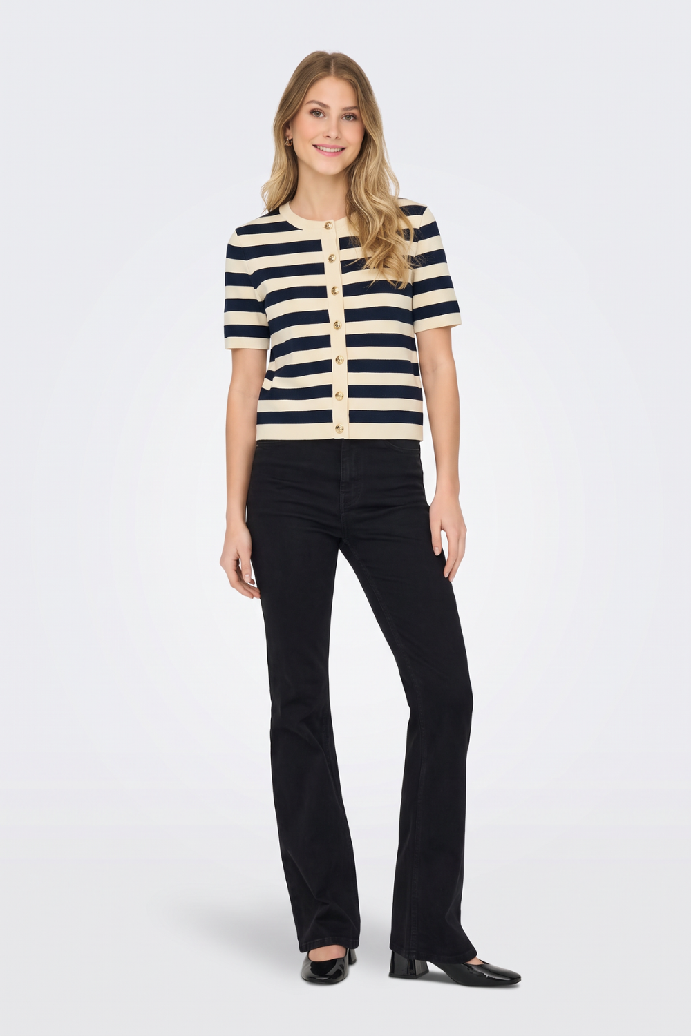 Striped short sleeve cardigan with gold buttons, full length on model