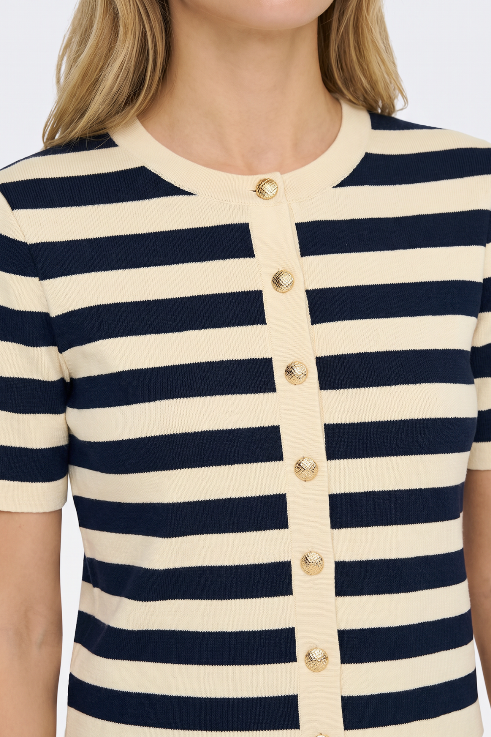 Gold-tone button detail on navy striped cardigan