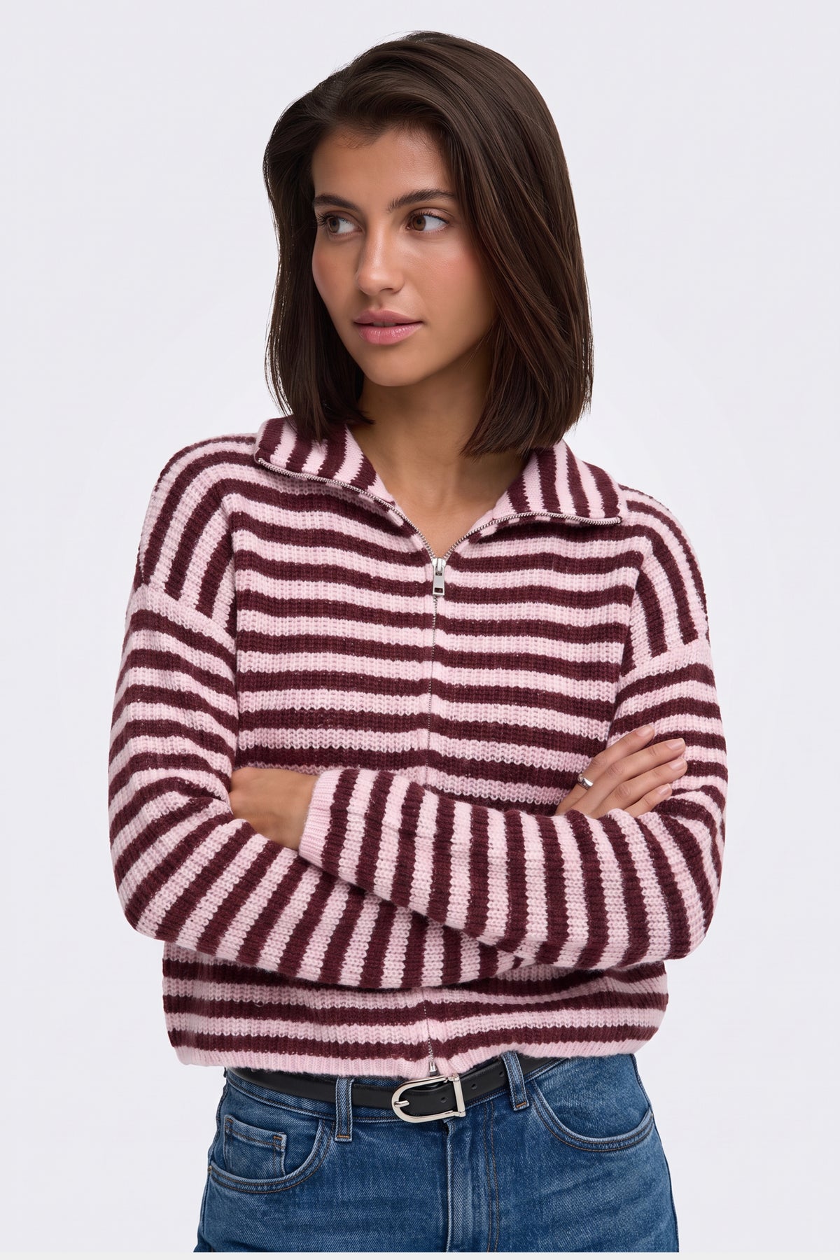 Burgundy piece styled with denim on model