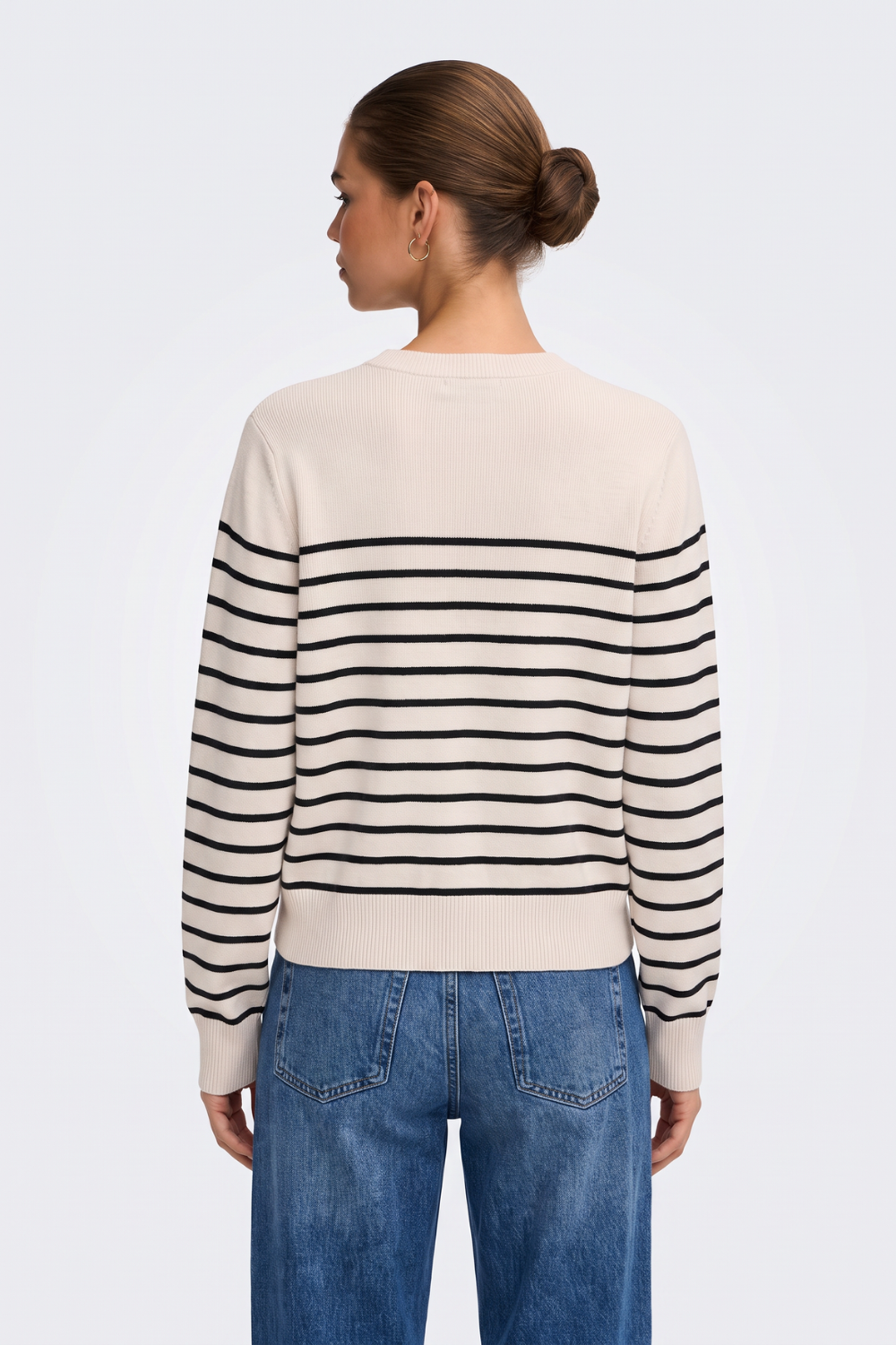 Cream breton striped jumper back view on model