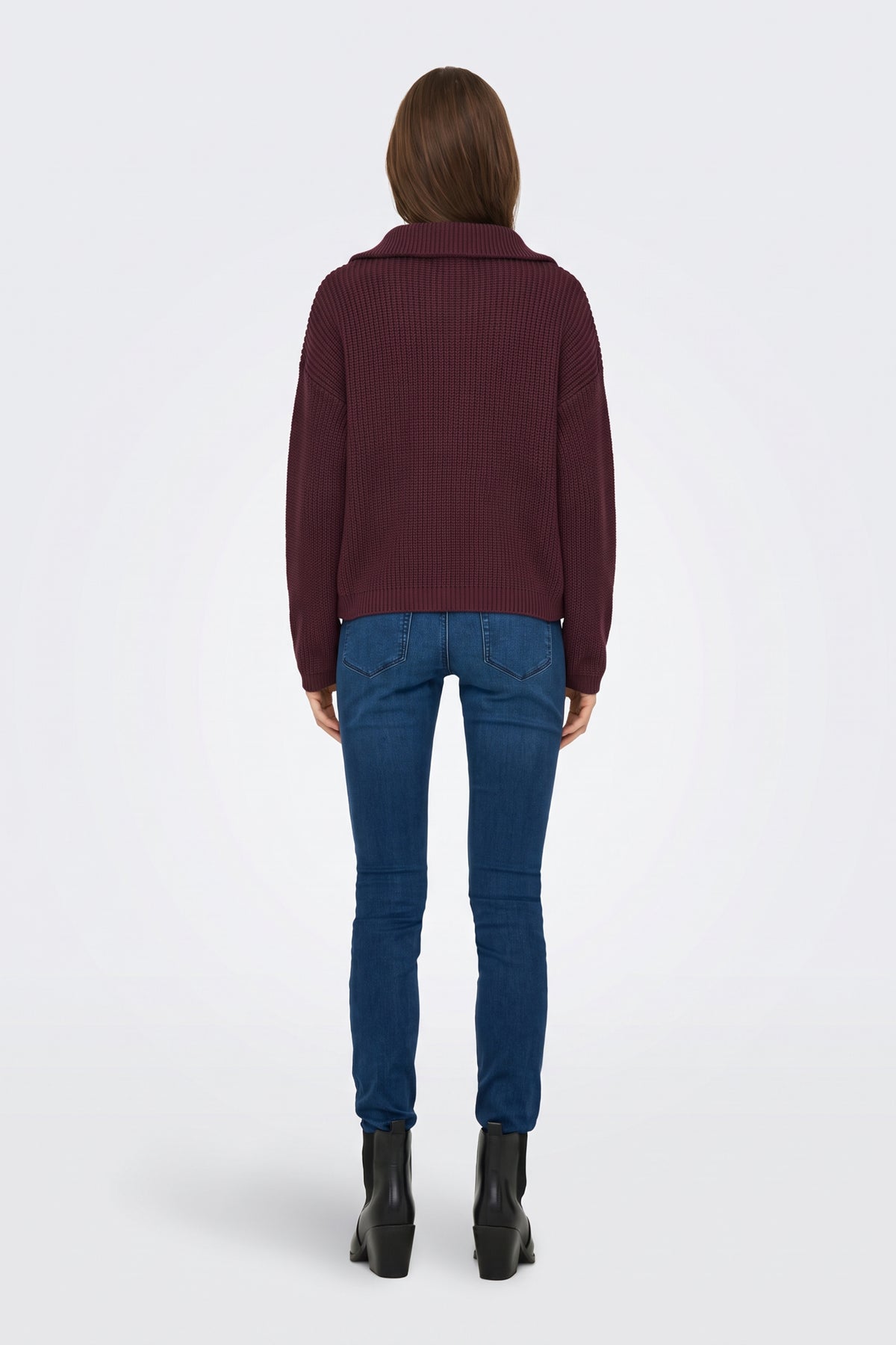 Burgundy piece worn on model, side view
