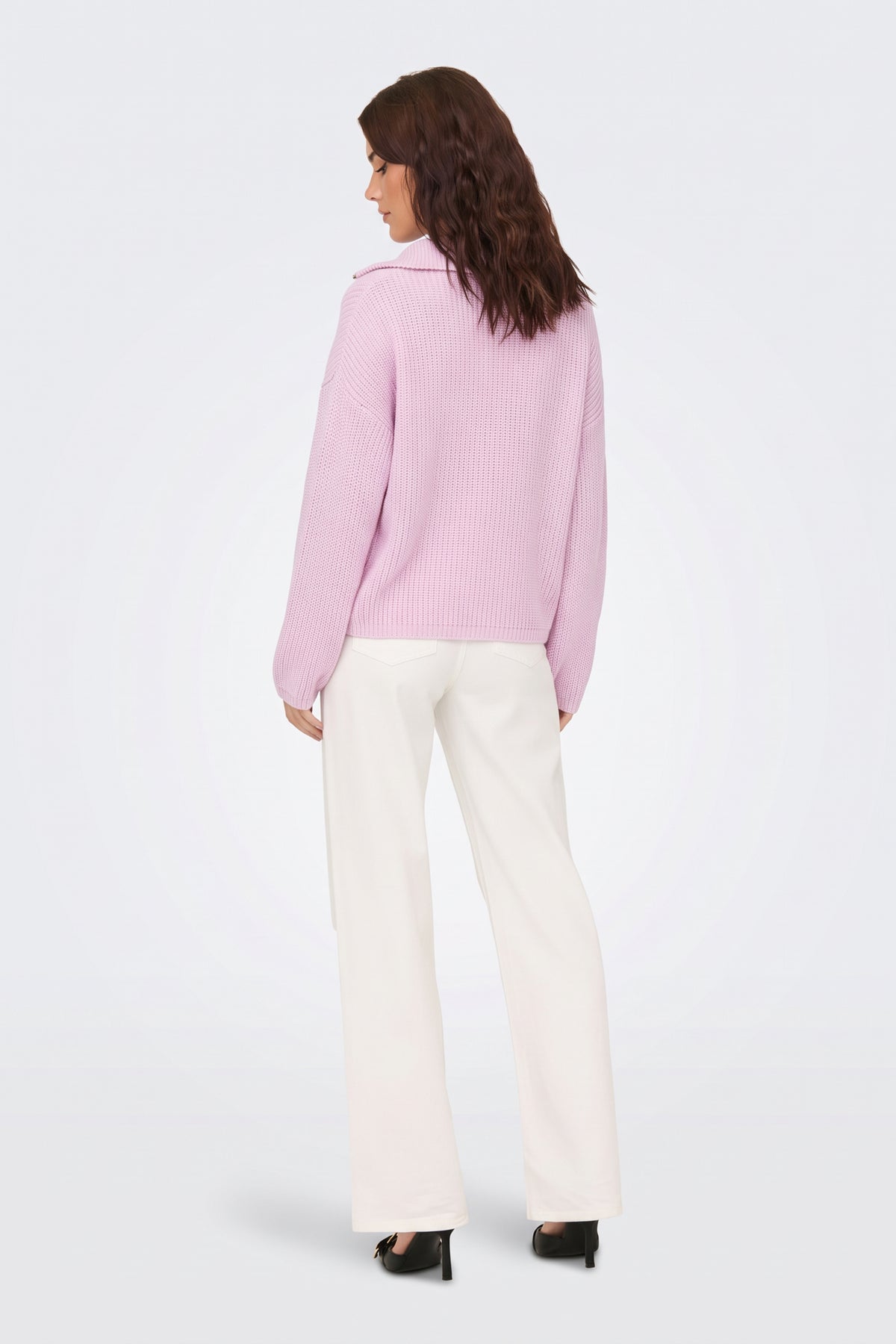 Pink piece worn on model, back view